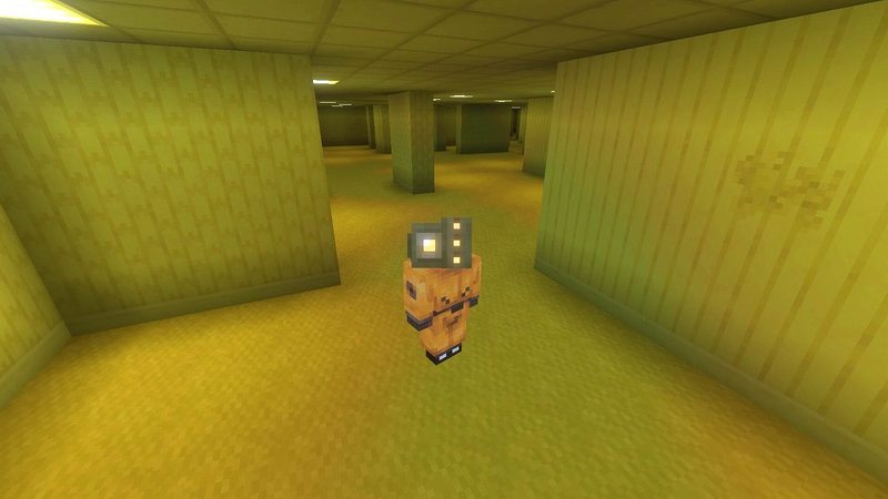マイクラ統合版BACKROOMS Add-Onの黄色いロビーで、スペクトルバイザーとハズマット装備を身につけたプレイヤー