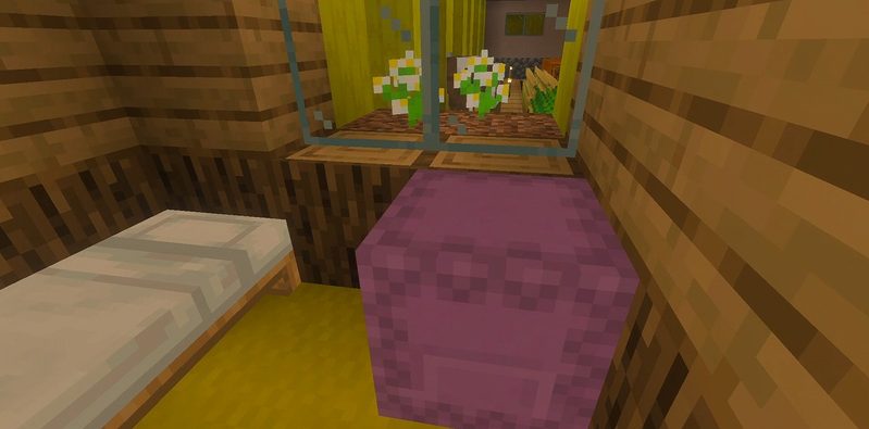 マイクラ統合版BACKROOMS Add-Onの農場奥にある、ベッドと紫色のシュルカーボックスが置かれた部屋